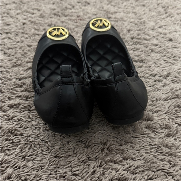 Michael Kors Black Ballet Flats with Gold Emblem - Picture 3 of 4